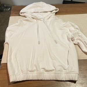 Lululemon crop sweater, sweater has split and opening in the back